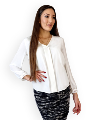 White shirt with long sleeves and hidden buttons